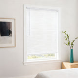 White PVC window blind with horizontal slats, closed over a window