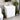 White freestanding bathroom vanity with built-in ceramic sink and two-door front storage