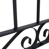 Black wrought iron gate base with curved scroll motif and horizontal frame bar.