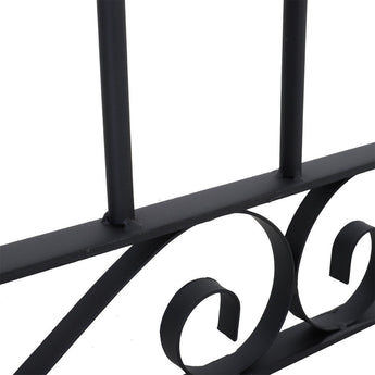 Black wrought iron gate base with curved scroll motif and horizontal frame bar.