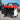 Portable gasoline generator power station with red top handle and black engine housing
