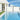 White retractable privacy screen with gray frame along an outdoor swimming pool