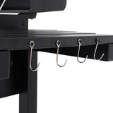 Stainless side hooks attached to the side shelf on a charcoal BBQ grill