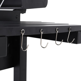 Stainless side hooks attached to the side shelf on a charcoal BBQ grill
