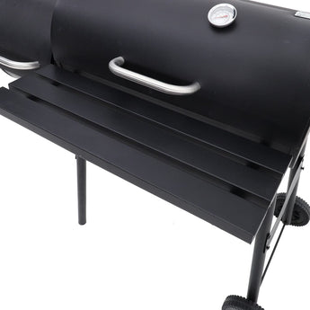 Charcoal grill lid handle and thermometer on front control panel, with side shelf