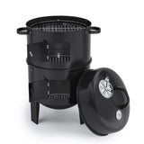 Black 3-in-1 smoker grill with stacked grates, front firebox doors, and lid
