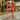 Red 20 ton hydraulic floor press with two springs and hand lever, standing frame