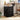 Black filing cabinet with three drawers and silver pulls on caster wheels