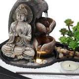 Buddha-Skulptur mit Wasserlauf, Kieselsteinen und Teelicht in Schale