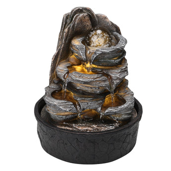 Front view of tiered tabletop fountain with LED-lit cascade and dark stone-texture base