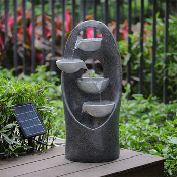 4-tier cascading garden fountain with dark speckled finish and flowing water streams