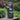 4-tier cascading garden fountain with dark speckled finish and flowing water streams