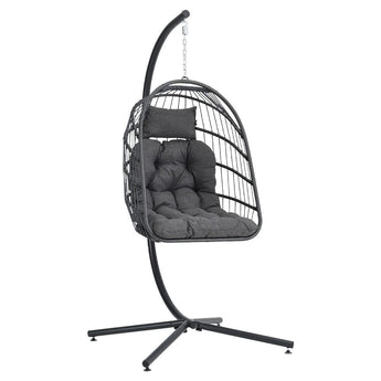 Black rattan swing chair with dark gray cushions and base stand, front view