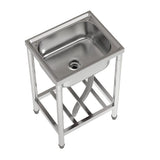 Stainless steel square sink basin with circular drain hole on supported frame.