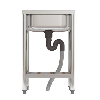 Stainless sink underside: drain outlet, U-shaped trap, and flexible hose under shelf.