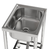Stainless steel sink bowl with drain strainer opening on square rim frame.
