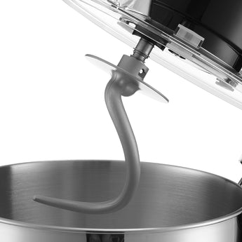 Single beater attachment over stainless bowl, close-up