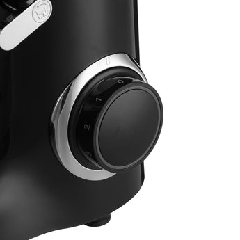 Black stand mixer speed dial knob with numbered settings on the head
