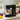 8-quart black stand mixer with stainless steel mixing bowl and clear splash guard