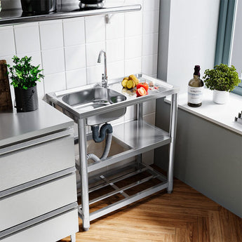 Stainless steel single-compartment sink with faucet and lower storage shelves
