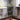 Stainless steel one-compartment sink unit with faucet and open under-shelf storage