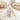 Children’s teepee play tent in white, child playing inside on floor mat