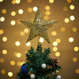 Gold sequin star tree topper with LED lights on a hinged spiral base