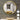 Round bathroom mirror with gold-tone frame, wall-hanging design