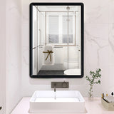 Black rectangular wall mirror with clear reflective glass panel