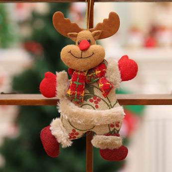 Plush reindeer Christmas ornament with plaid scarf and red nose