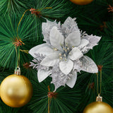 Artificial silver poinsettia flower ornament with glitter petals and ornament baubles
