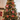 Red wooden hanging ornaments: star, gingerbread house, rocking horse, ginger man