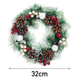 32cm snow-flocked Christmas wreath with pinecones, red berries and white baubles