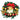Artificial Christmas wreath with red bow, gold bells and baubles, and gold lace accents