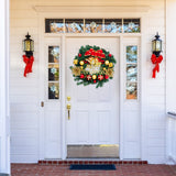 Christmas wreath featuring green foliage, gold bells, red bow, and red and gold baubles