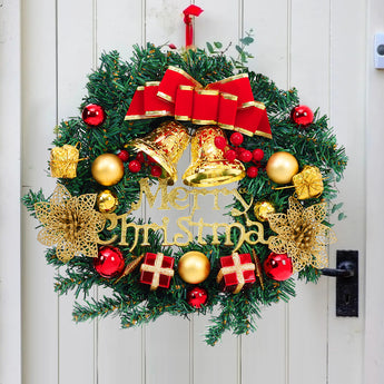 Artificial Christmas wreath with green foliage, red and gold baubles, gold bells, bow