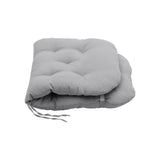 Rocking chair seat pad, light gray tufted cushion with visible tie strings