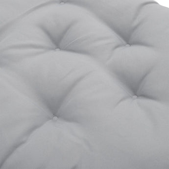Rocking chair seat pad tufted surface, light gray cushioned buttons close-up