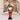Standing Santa Claus plush doll with white beard, green patterned vest, red pants, black shoes