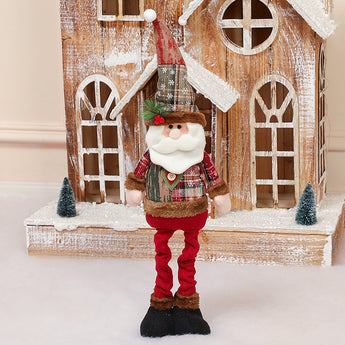 Standing Santa Claus plush doll with white beard, green patterned vest, red pants, black shoes