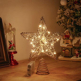 Pre-lit metal star Christmas tree topper with warm white lights and bead accents