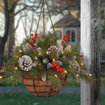 Pre-lit hanging Christmas basket with pine branches, red berries, pine cones, warm LEDs