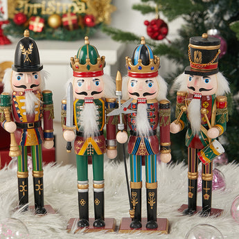 Christmas nutcracker soldier figurines set of four, standing in colorful uniforms and crowns
