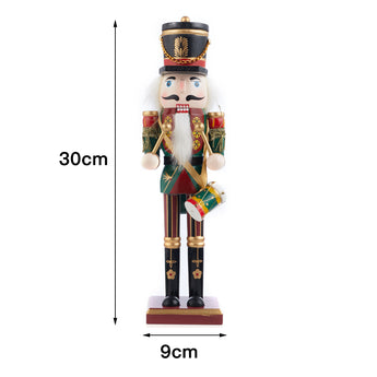 Christmas nutcracker soldier figurine, 30cm tall; base 9cm wide; black hat and green outfit