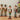 Christmas nutcracker soldier figurines set of four, standing with varied crowns and outfits