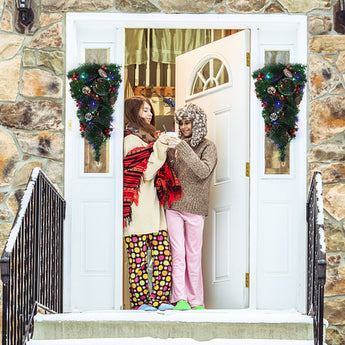 Teardrop Christmas swag with multicolor LED lights and ribbon accents