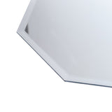 Close-up of octagonal mirror beveled edge and smooth white frame