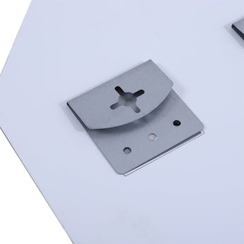 Mounting bracket and screws on the back of an octagonal wall mirror