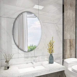 Oval, wall-mounted frameless mirror with smooth reflective glass