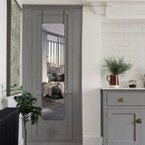 Door-hanging full length mirror with rounded edges and dark frame